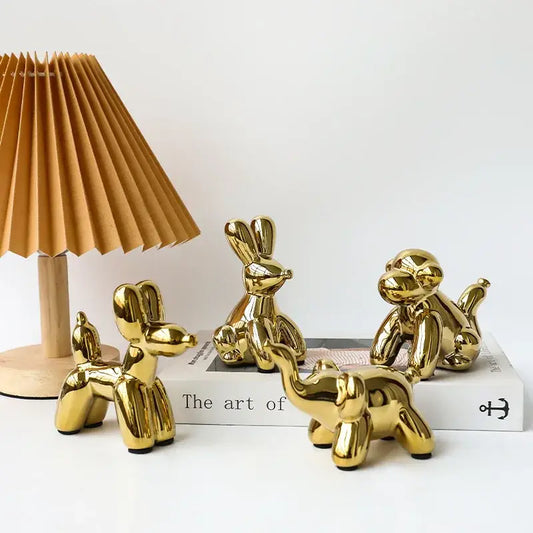 Golden glossy porcelain balloon animal desk ornaments in various poses ideal for decorbites golden monkey decor
