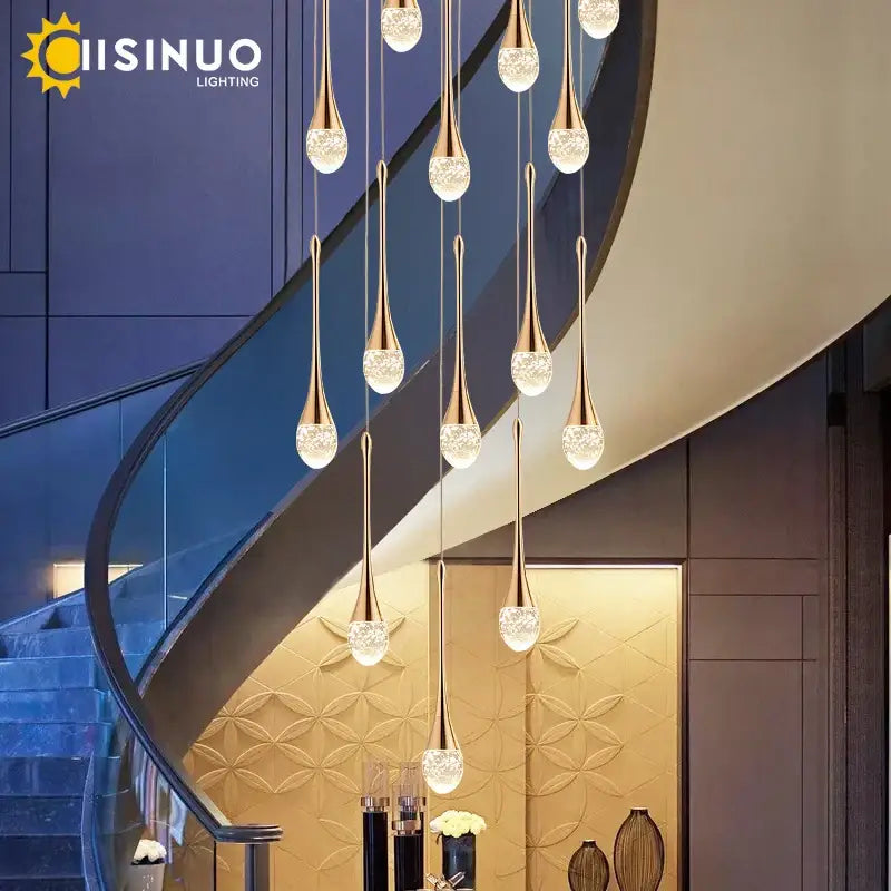 Golden teardrop crystal staircase chandelier with glass globes for living room decorbites crystal staircase lighting