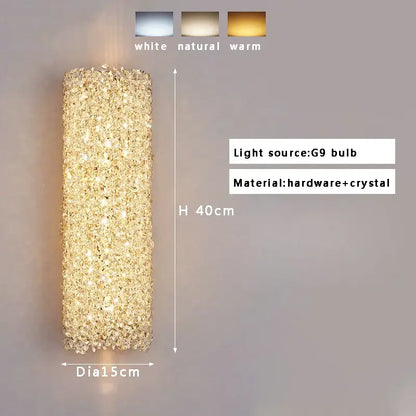 A 40cm tall golden textured glass wall lamp with decorbites crystal beads emitting warm living room illumination
