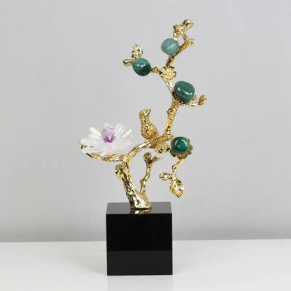 Golden tree brass amethyst crystal flower sculpture with emerald green stones and white flower on black base for living room decor