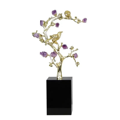 Golden tree brass amethyst crystal flower sculpture featuring a golden bird on branch with purple stones on black base