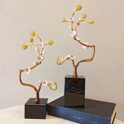Golden tree metal decor figurine with pink and white flowers and yellow beads on black square base for living room