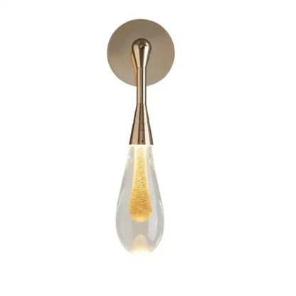 A modern brass-finished wall light with golden glitter teardrop glass shade from decorbites golden water droplets