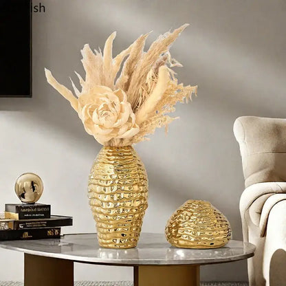 Golden wrinkle ceramic vase with textured honeycomb pattern and dried beige pampas grass for living room decorbites golden wrinkle decor