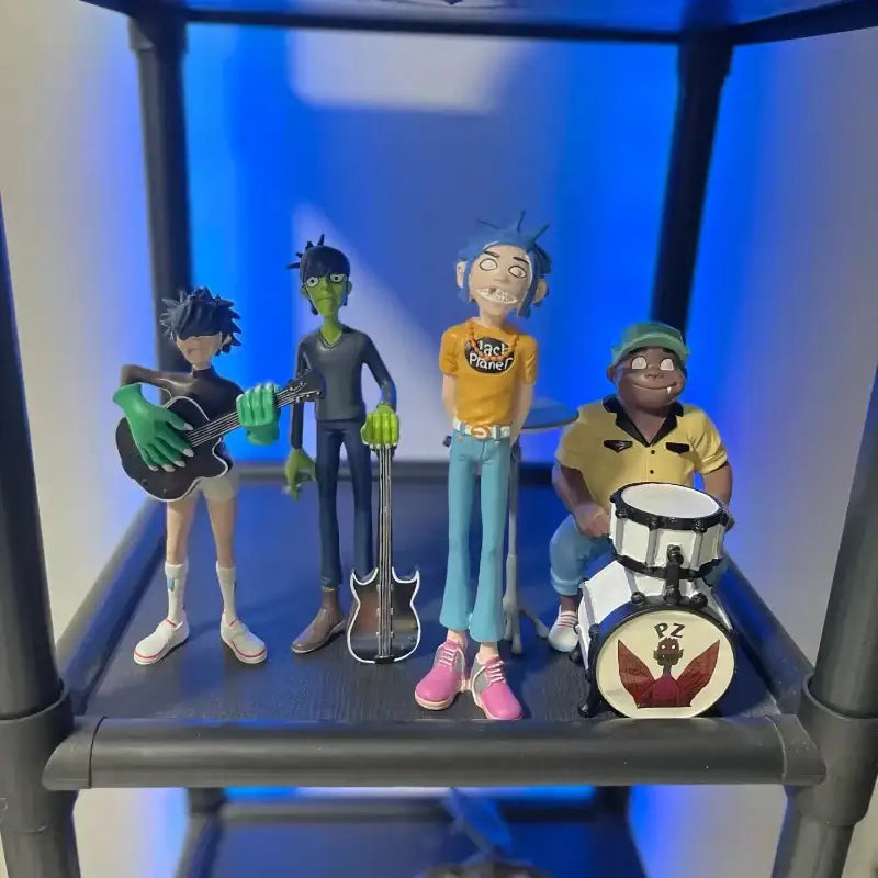 Gorillaz band resin action figure set featuring four colorful figurines with instruments for bedroom decor by decorbites