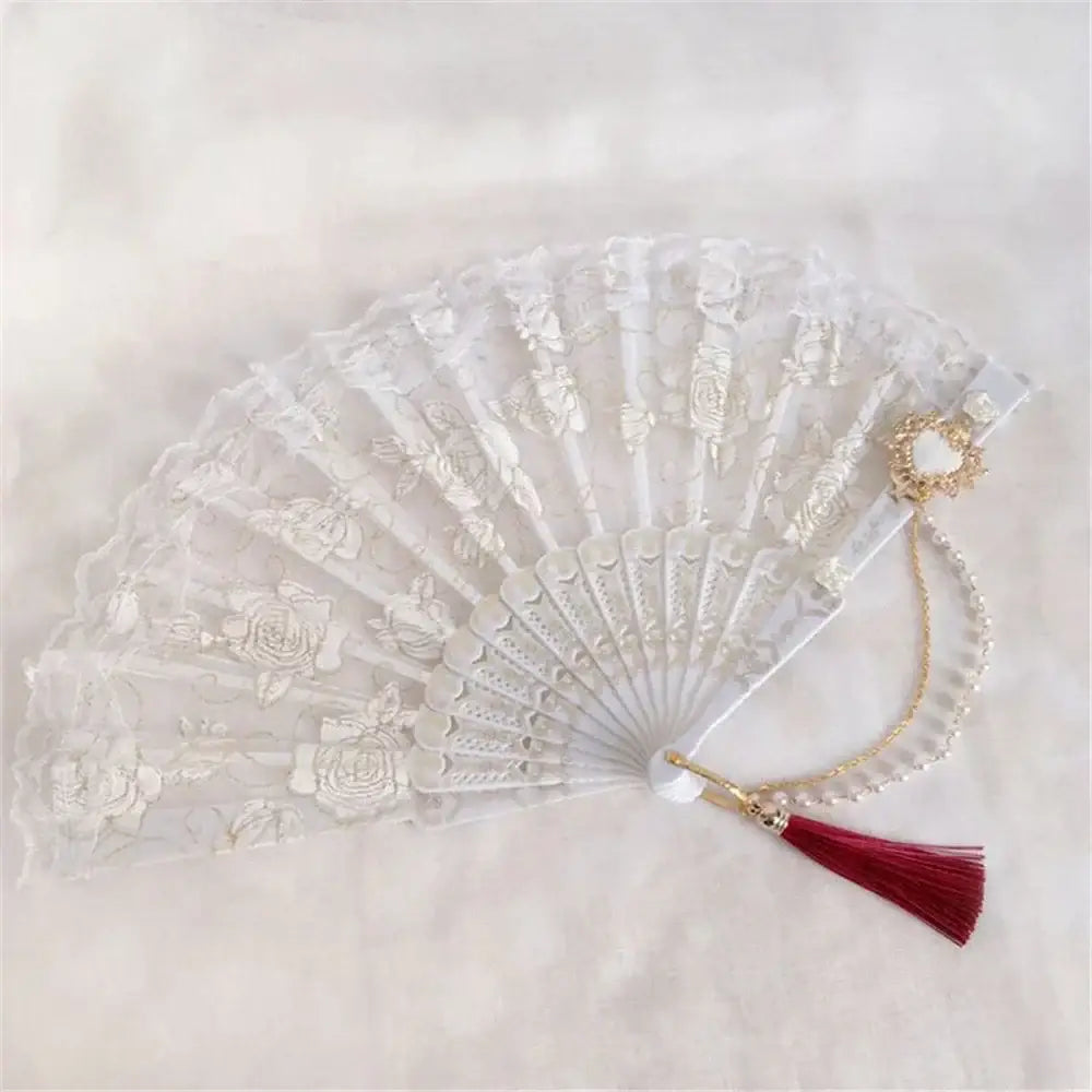White lace fan with delicate floral embroidery gold-toned decorative clasp and elegant gemstone handle for goth decorbites party decor
