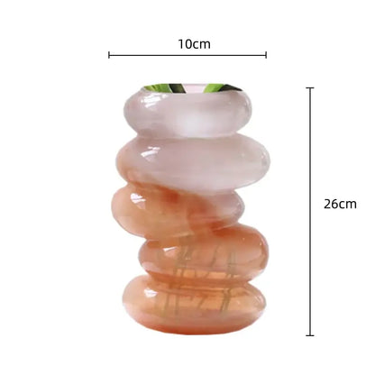 A translucent gradient color geometric glass vase in pale pink to warm amber hues for living room decorbites decor