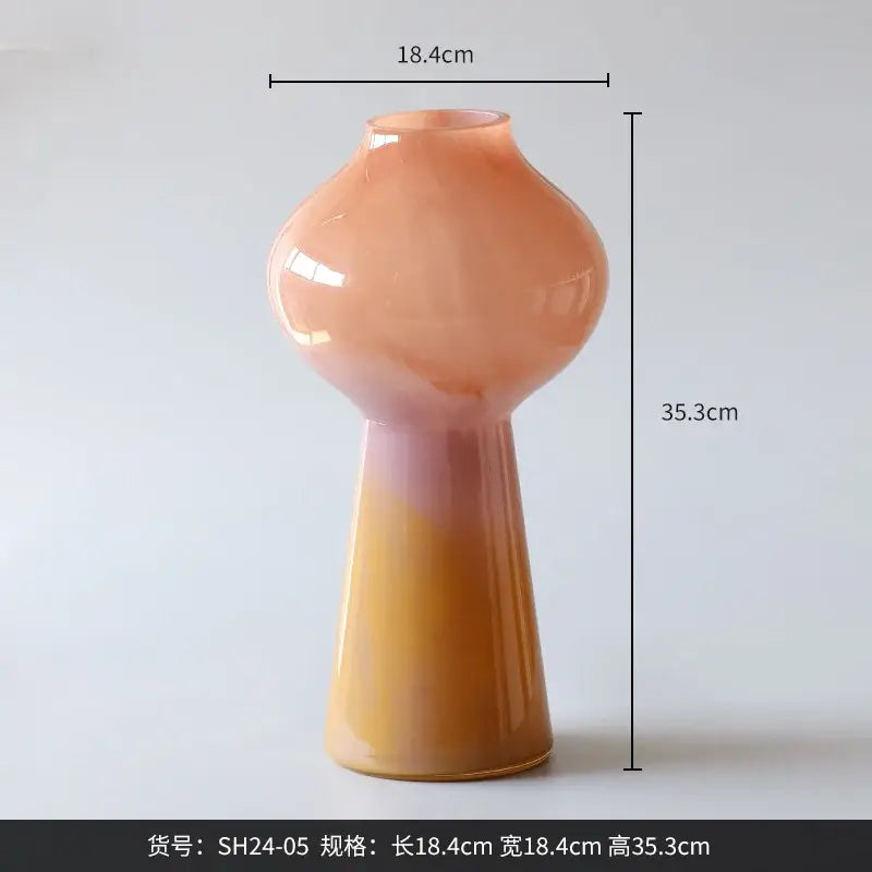 A sleek decorbites gradient glass vase set of 2 with rounded bulbous top and tapered base for living room decor