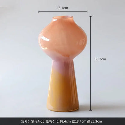 A sleek decorbites gradient glass vase set of 2 with rounded bulbous top and tapered base for living room decor