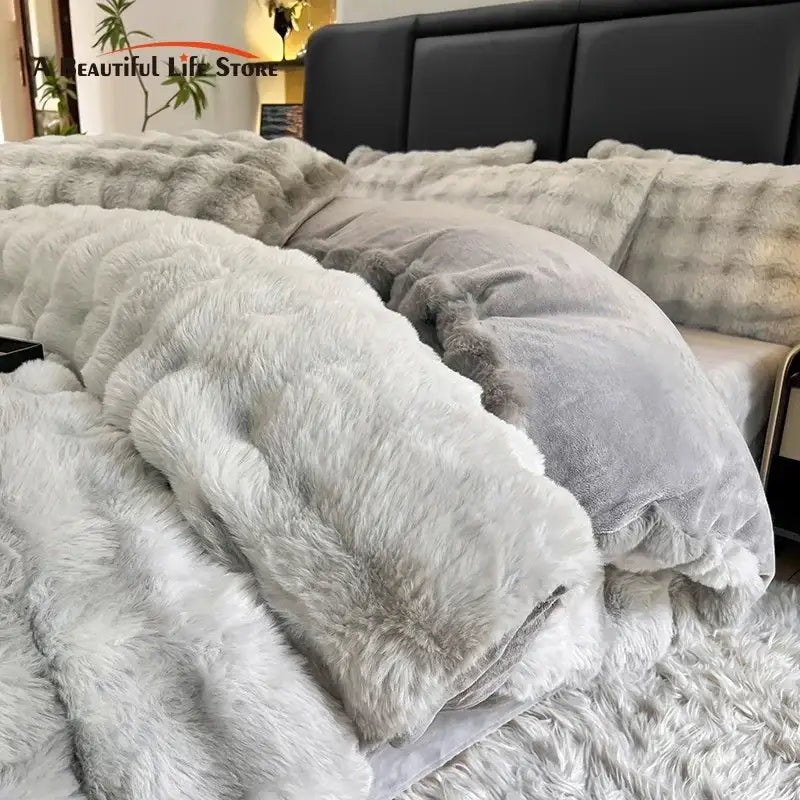 Soft plush gradient gray faux fur throw blanket with cozy textured surface in decorbites gradient gray bedding set