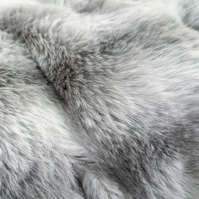 Soft plush gray faux fur blanket with luxurious textured surface in decorbites gradient gray faux bedding set