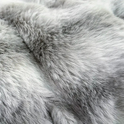Soft plush gray faux fur blanket with luxurious textured surface in decorbites gradient gray faux bedding set