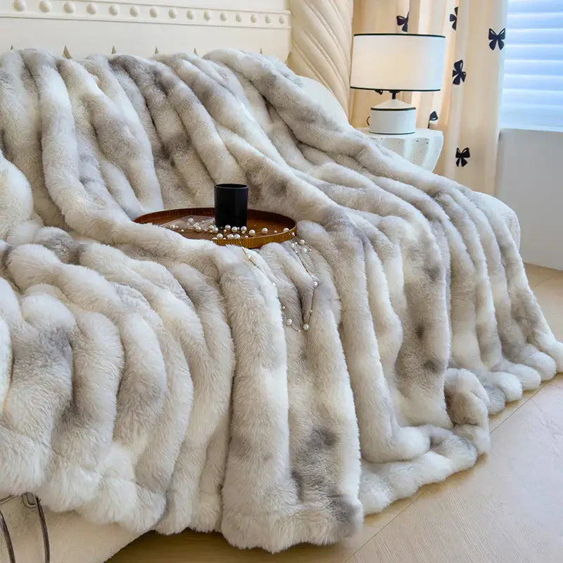 A plush grey cashmere fleece chunky knit throw blanket in soft white and grey mottled pattern for bedroom decorbites gradient grey