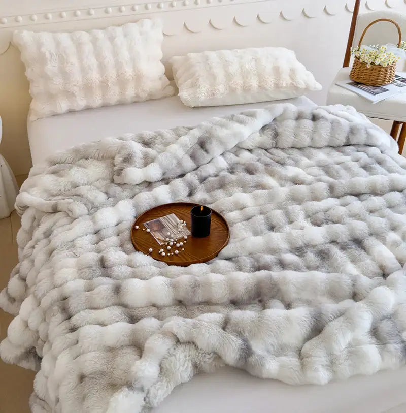 A plush chunky knit grey cashmere fleece throw blanket with a soft textured surface for bedroom decorbites gradient grey