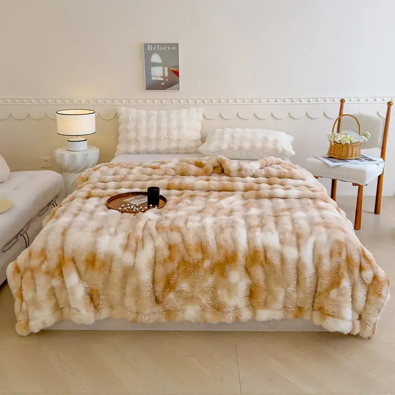 Cream and tan faux fur throw blanket with plush textured surface complementing decorbites gradient grey cashmere fleece decor