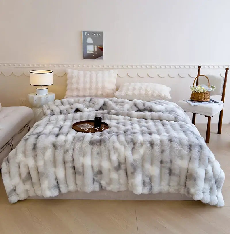 A plush gradient grey cashmere fleece chunky knit throw blanket with soft textured surface for bedroom decorbites decor