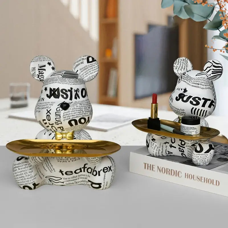 White bear figurine with black newspaper print design and gold tray base decorbites graffiti bear living room sculpture