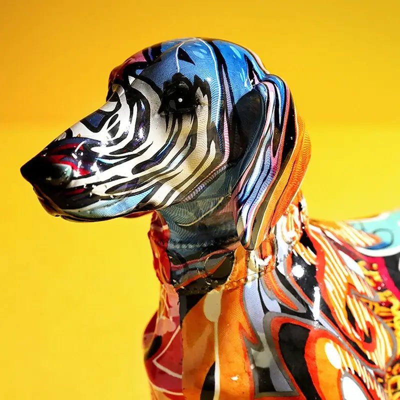 Vibrant and glossy resin statue of a colorful dachshund with psychedelic blue orange black and white swirls for living room decor