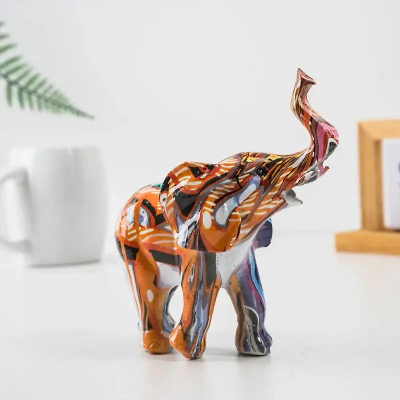 Vibrant graffiti colorful elephant resin figurines art with flowing orange black and metallic accents for living room decorbites elephant resin