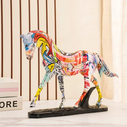 A vibrant graffiti style colorful resin horse statue with glossy finish in reds yellows blues and purples for living room decor