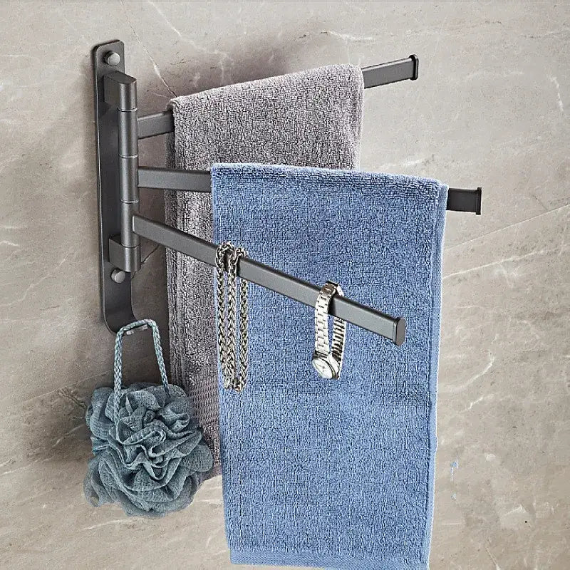 Black metal wall-mounted towel hanger with three extendable arms holding gray and blue towels decorbites gray aluminum swivel