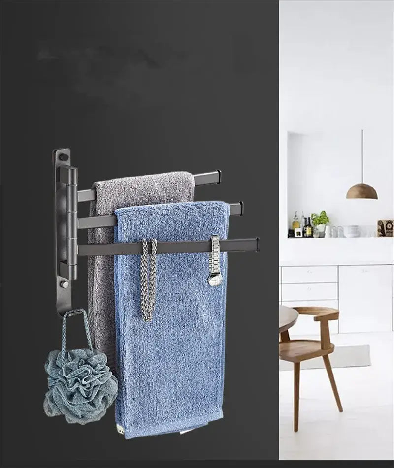Modern black metal wall-mounted towel hanger with three bars holding blue and gray towels by decorbites gray aluminum swivel