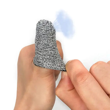 Gray and black speckled knitted finger protector sleeves provide anti-cut protection for safe kitchen use