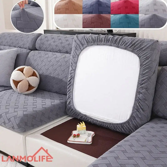 Gray and white woven elastic sofa slipcover with elastic edge and white center panel for living room sofa