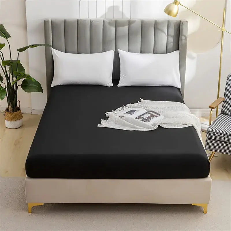 Black decorbites brushed fitted mattress cover made of smooth stretchy fabric snugly fitted on mattress