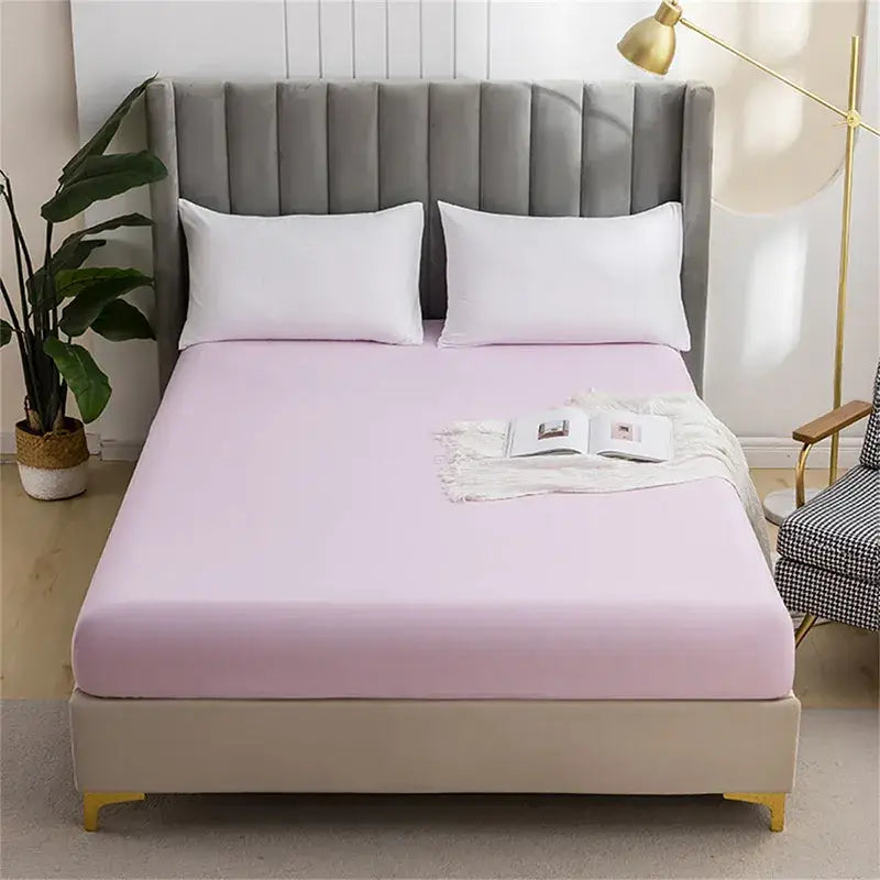 A soft lavender decorbites brushed fitted mattress cover with smooth stretchy fabric snugly fitting the bed