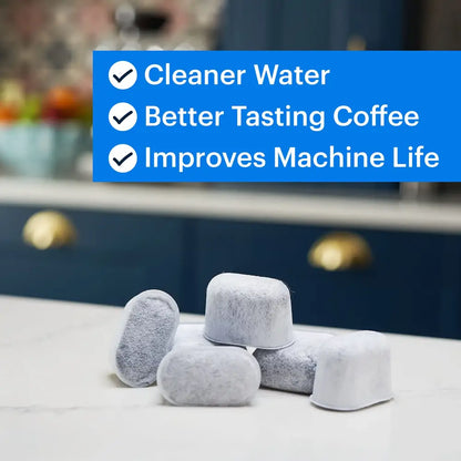 Gray charcoal espresso machine water filter cartridges with textured porous surface for machine water filtration in kitchen