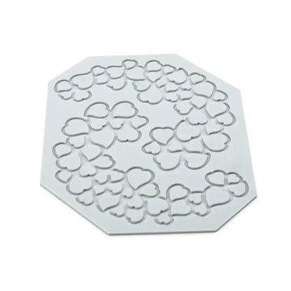 White octagonal silicone mold with intricate raised heart leaf pattern from gray floral and decorbites heart leaf set