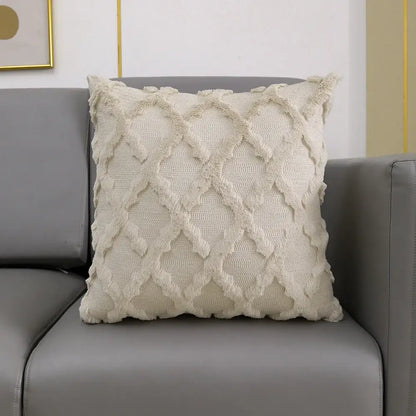 Cream-colored cushion cover with diamond lattice pattern and frayed edges featuring decorbites fluffy embroidery decor