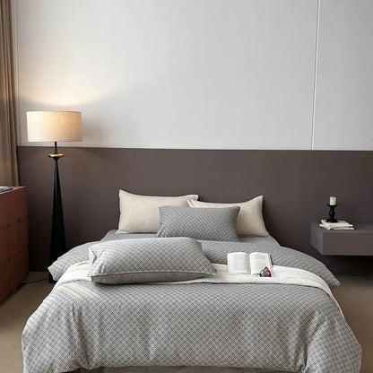 Gray geometric linen cotton jacquard bedding set with subtle pattern matching pillows and soft white blanket for bedroom decor