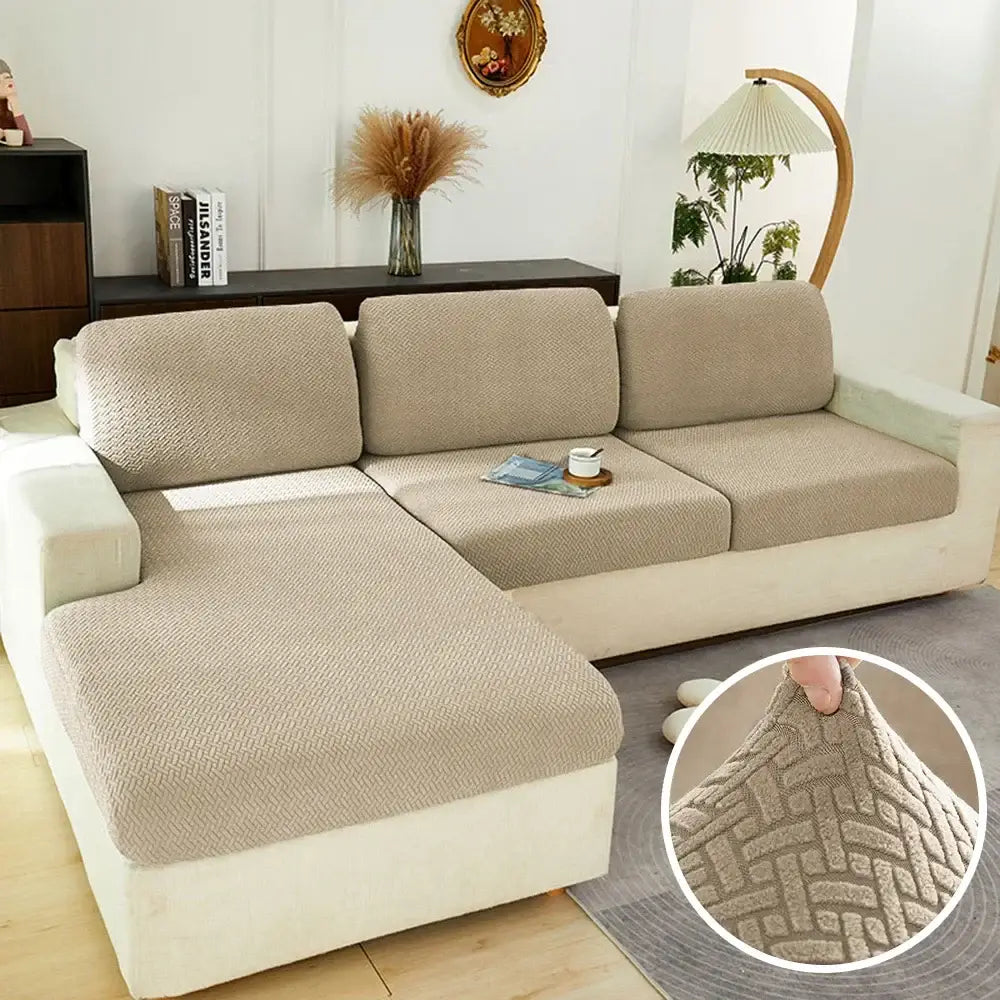 Beige textured fabric sofa cover with subtle geometric pattern for gray herringbone stretch sofa seat protector