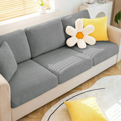 Gray herringbone stretch sofa seat cover with soft textured fabric for living room furniture protection