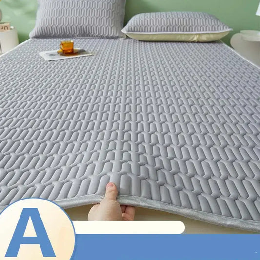 Gray quilted cooling latex summer mat set with textured honeycomb pattern and stitched edges for bedroom use