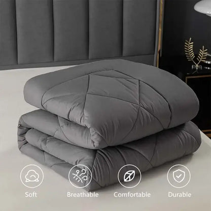 Stacked gray quilt with diamond-stitched pattern from decorbites cozy quilt set for soft bedroom comfort and decor