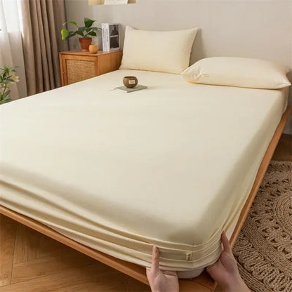 Cream-colored smooth textured fitted sheet with elastic edges from gray red and black plaid cotton sheet set decorbites coarse cloth