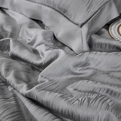 Luxurious silver-gray satin summer quilt set with subtle striped texture and elegant stitched detailing for bedroom bedding