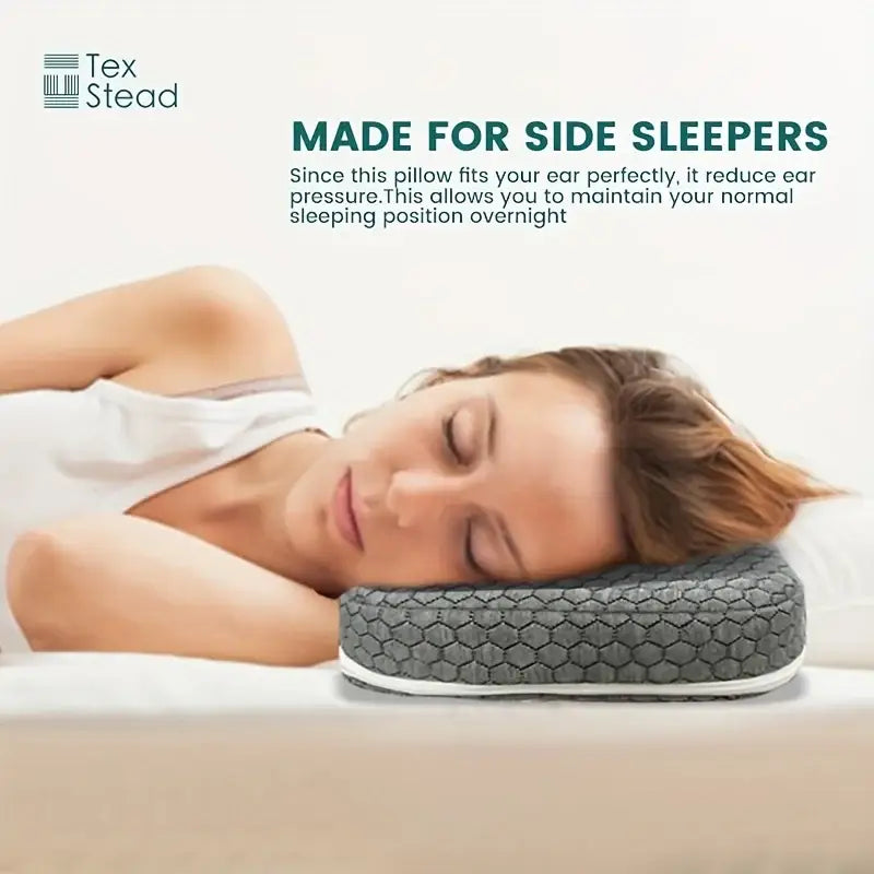 Gray hexagonal-textured comfort ear guard pillow designed for side sleepers with cnh relief hole for decorbites comfort ear use