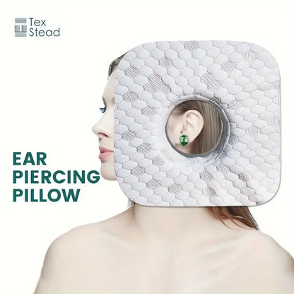 Gray textured decorbites comfort ear guard pillow with white hexagonal pattern and circular relief hole for ear pain