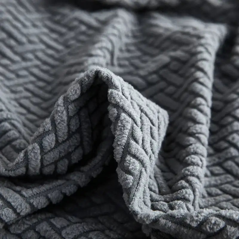 Gray textured jacquard sofa cover with raised woven braided pattern by decorbites for living room decor