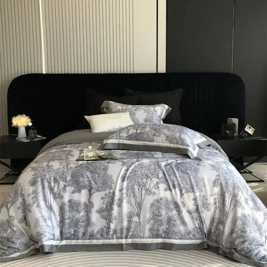 Gray and white forest toile bedding set with subtle sheen featuring elegant tree silhouettes and decorbites jungle print flowers