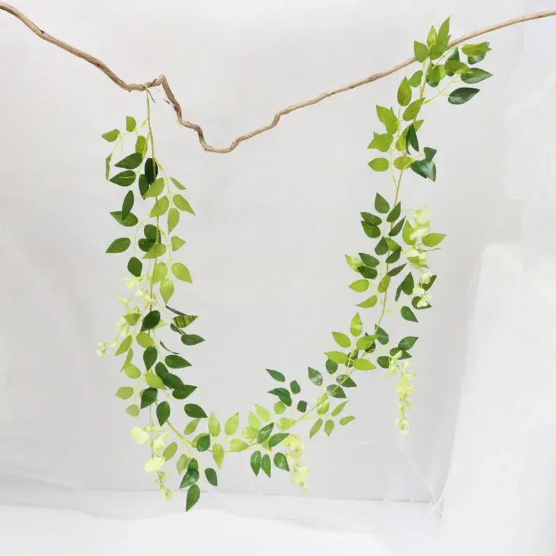 Green and white artificial flowers garden wedding arch decor with delicate decorbites artificial vine garland on rustic branch