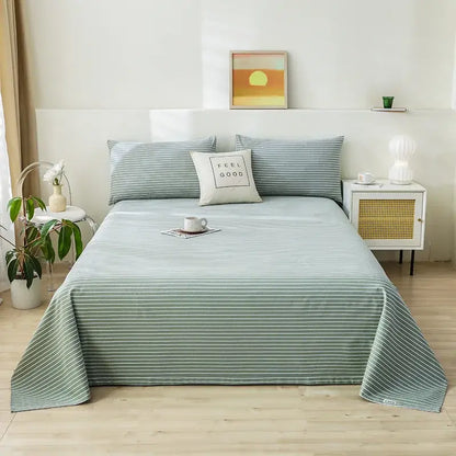 A soft mint green and white thin striped printed cotton bedspread for bedroom decor from decorbites cartoon printed collection