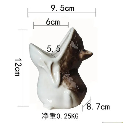 A glossy white and brown ceramic fox figurine flower pot designed as decorbites cute frog succulent garden decor