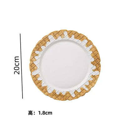 White ceramic plate with golden waffle-patterned rim and decorative icing from decorbites creative biscuit ceramic tableware set