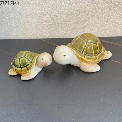 Green ceramic turtle statue desk decoration with glossy green and cream shells and detailed scaly patterns