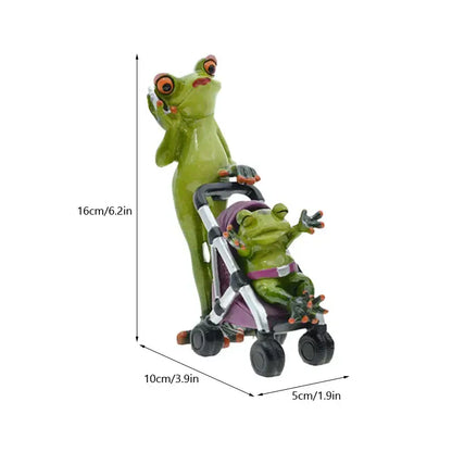 Green resin decorbites frog family statue set featuring detailed orange eyes and black-tipped toes for living room decor